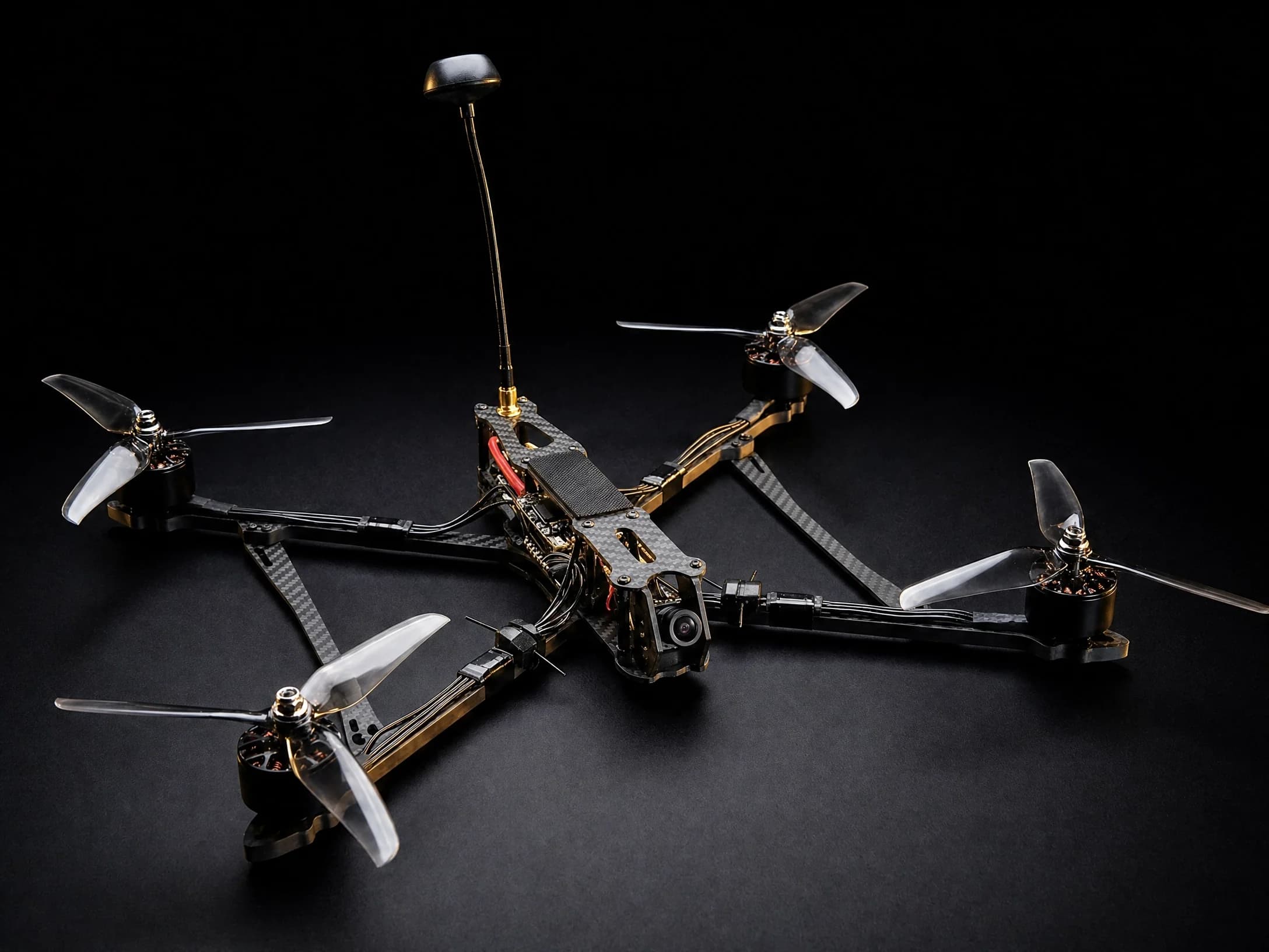 Unmanned Industries P100 FPV attritable reconnaissance airframe on a dark studio background